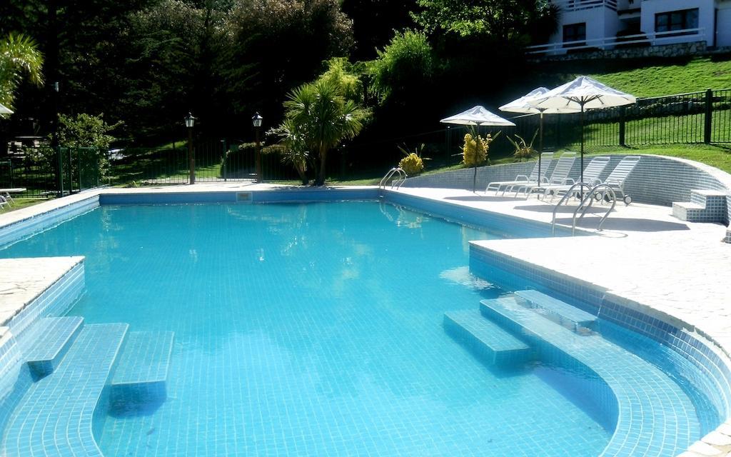 Las Ardillas Cabanas Y Suites La Falda Luaran gambar